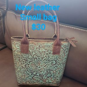 Small leather turquoise tooled purse